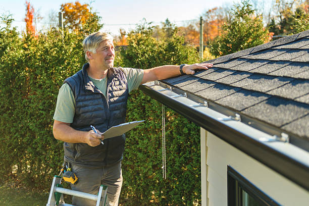 Professional Roofing technician working in Houston, DE